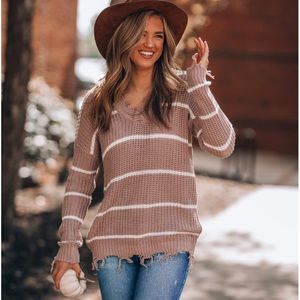 Distressed striped sweater